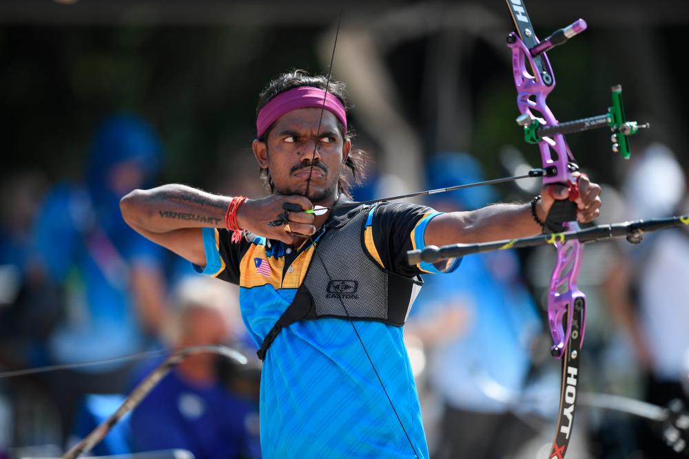 National para archery athlete Suresh Selvathamby fires an archer in the Recurve event at the 2020 Tokyo Paralympics Games in Yumenoshima Park Archery Course today.- BERNAMApix