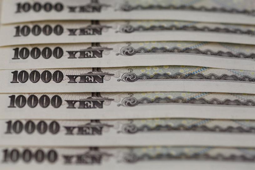 Japanese 10,000 yen notes line up in Tokyo. - REUTERS/Shohei Miyano