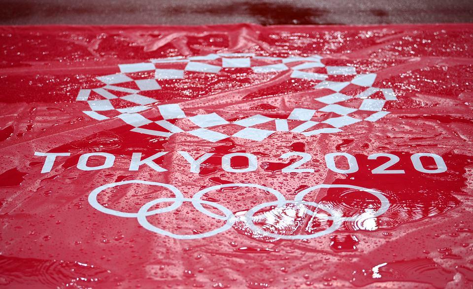 Tokyo 2020 Olympics - Athletics - OLS - Olympic Stadium, Tokyo, Japan - July 30, 2021. General view of rainy weather conditions and the Tokyo 2020 Olympics logo seen inside the stadium REUTERSPIX