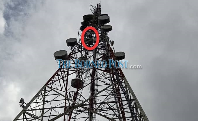 Rescuers are continuing their efforts to coax an unidentified man down from the telecommunication tower at Bukit Memaloh, here, today, more than 24 hours since he scaled the 100m high structure.