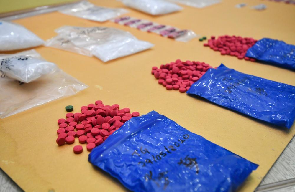 RM31,080 worth of meth and ‘pil kuda’ that were seized after arresting a boy and his parents in a raid on a home in Lorong Sekolah Arab, Jalan Hospital on Friday, at a press conference at the Kota Baru district police headquarters today. - Bernama