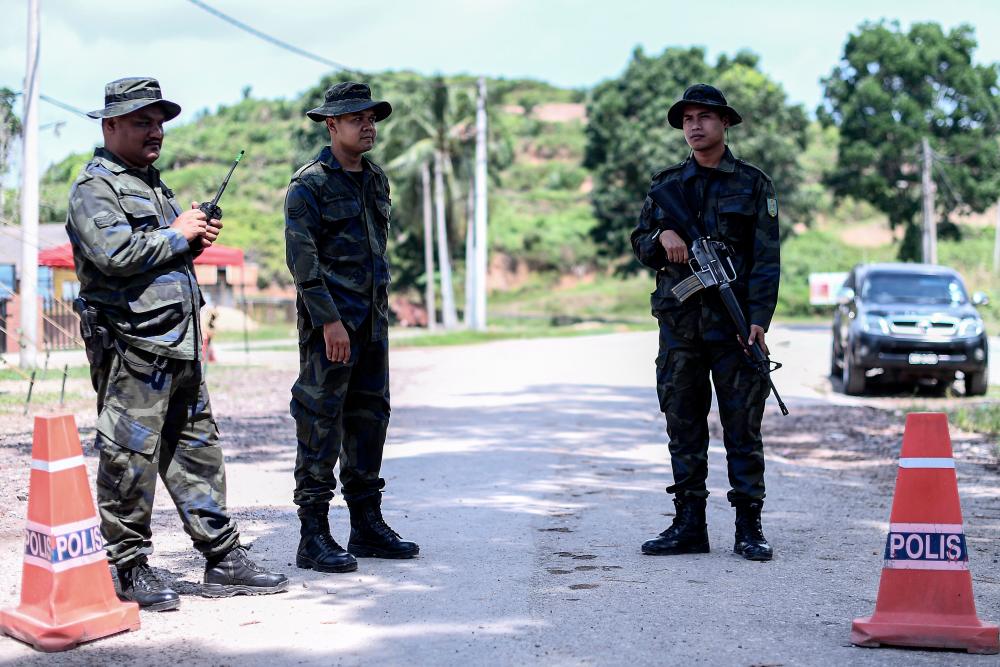 A road block on the only road to Kampung Orang Asli Kuala Koh, at Felda Aring 10, Gua Musang on June 12, 2019. Access is closed to the public and members of the media since the village was put under quarantine on June 10, 2019. — Bernama