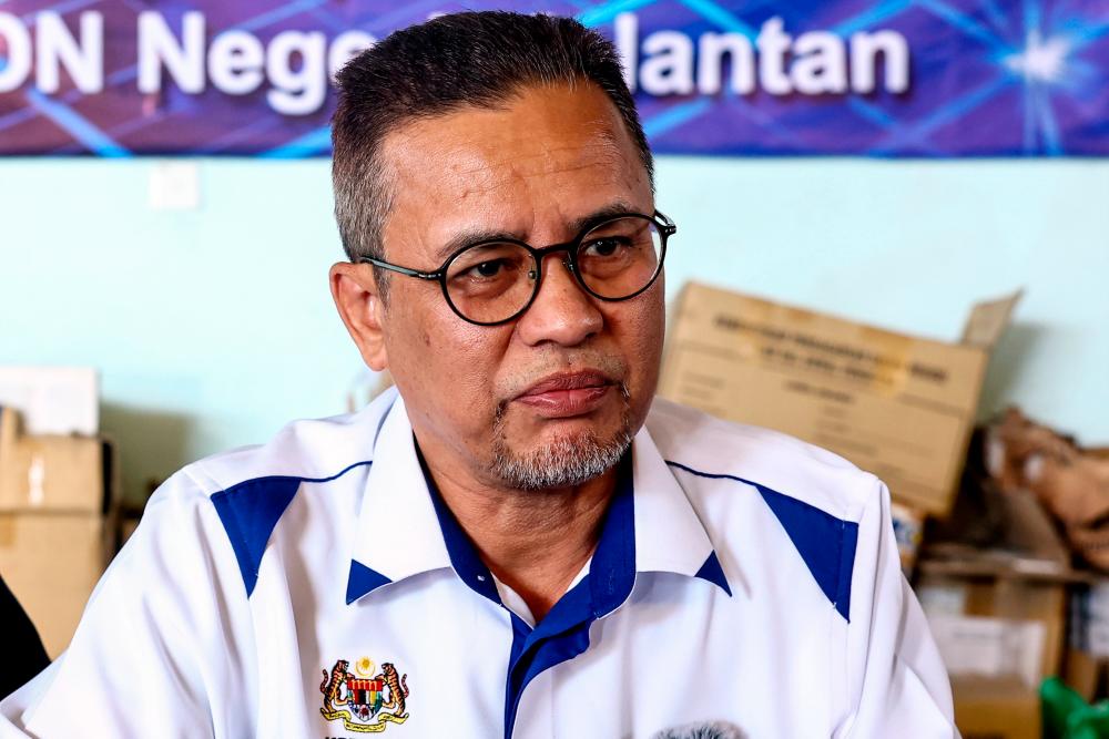 Pengarah Kementerian Perdagangan Dalam Negeri dan Kos Sara Hidup Kelantan, Azman Ismail. - fotoBERNAMA