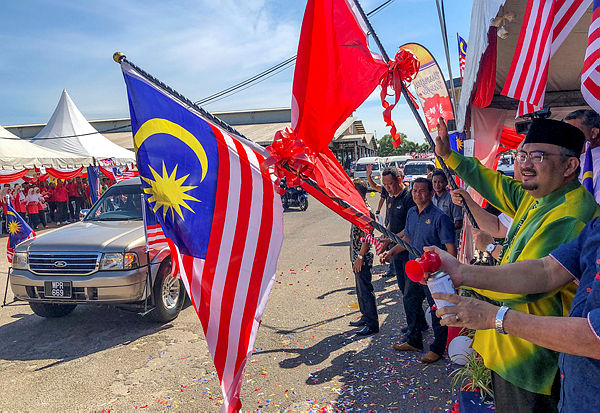 Filepix taken on Aug 16 shows the Kembara Merdeka Jalur Gemilang convoy leaving Kota Baru. — Bernama