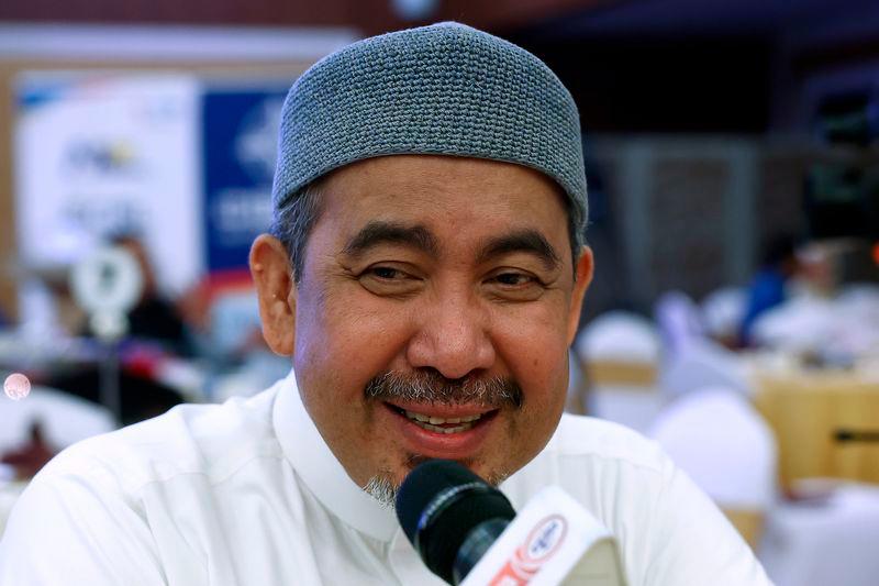 Pengerusi Jawatankuasa Kerja Raya, Infrastruktur, Air dan Pembangunan Luar Bandar Kelantan Datuk Dr Izani Husin - fotoBERNAMA