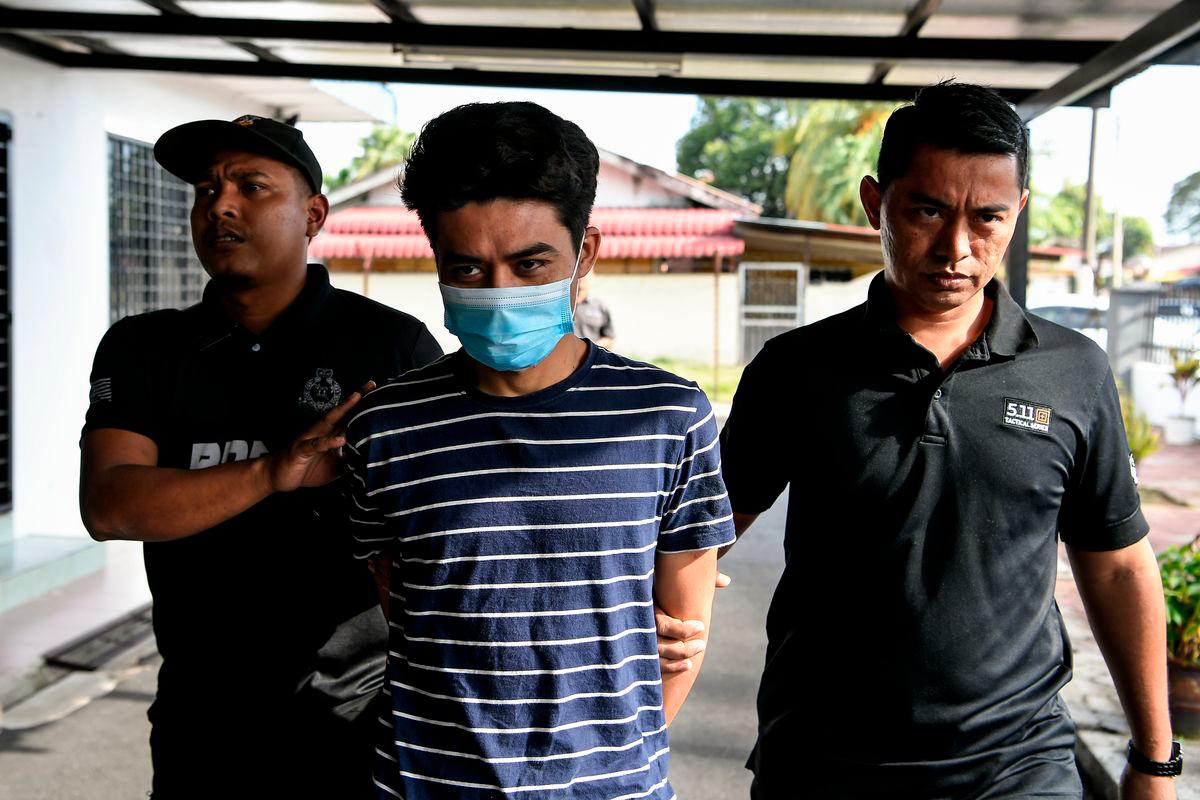 Syed Al Iqbal Syed Shahruddin, 30, dihadapkan di Mahkamah Majistret Gurun hari ini, atas pertuduhan membunuh seorang wanita dan peniaga telefon bimbit pada 11 September lalu. - fotoBERNAMA