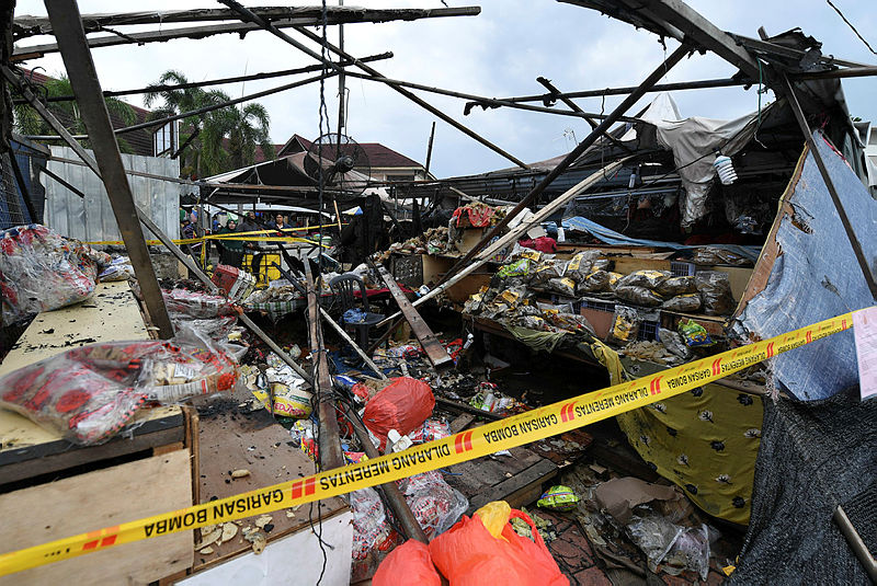 What remains of the keropoks stall at the Pasar Besar Kedai Payang, after it was destroyed in a fire last night. — Bernama