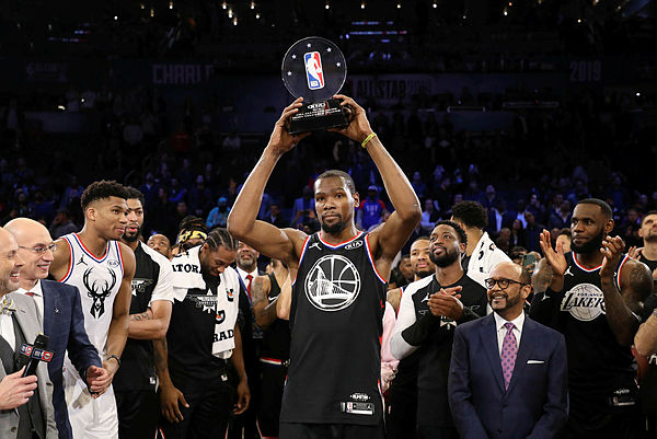 LeBron celebrates with the MVP trophy after their 178-164 win over Team Giannis during the NBA All-Star game — Reuters
