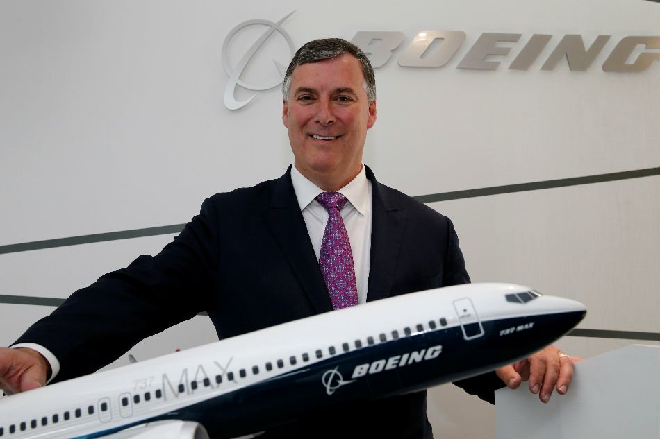 Boeing Commercial Airplanes president Kevin McAllister poses with a model of 737 MAX 10, during the 52nd Paris Air Show at Le Bourget Airport near Paris, France. -REUTERSPIX