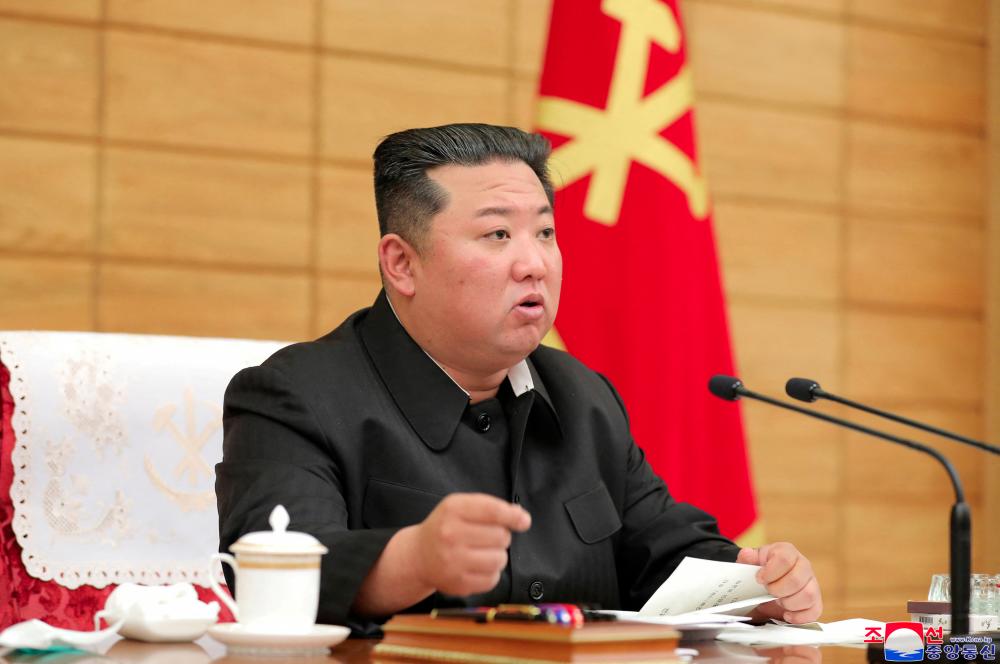 North Korean leader Kim Jong Un attends a Worker's Party meeting on coronavirus disease (Covid-19) outbreak response in this undated photo released by North Korea's Korean Central News Agency (KCNA) on May 15, 2022. KCNA via REUTERSpix
