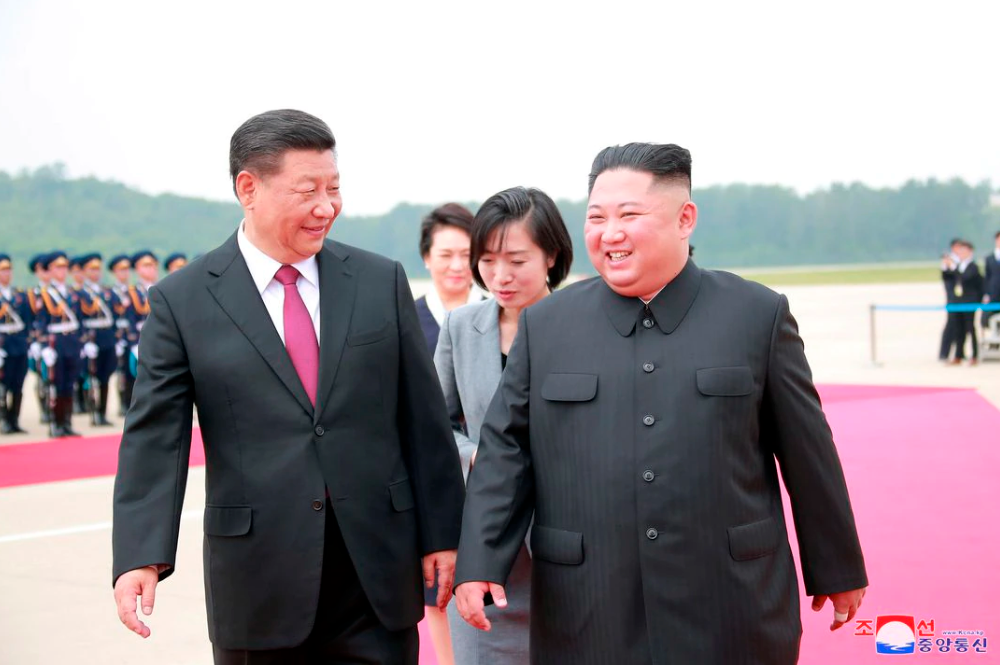 North Korean leader Kim Jong Un welcomes Chinese President Xi Jinping at the Pyongyang International Airport in Pyongyang, North Korea, in this undated photo released on June 21, 2019 by North Korea’s Korean Central News Agency (KCNA). REUTERSPIX