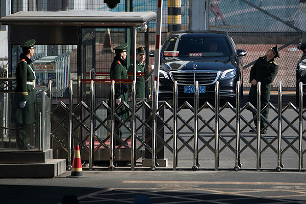 Chinese militaries stand before the arrival of North Korean General Kim Yong Chol. — AFP