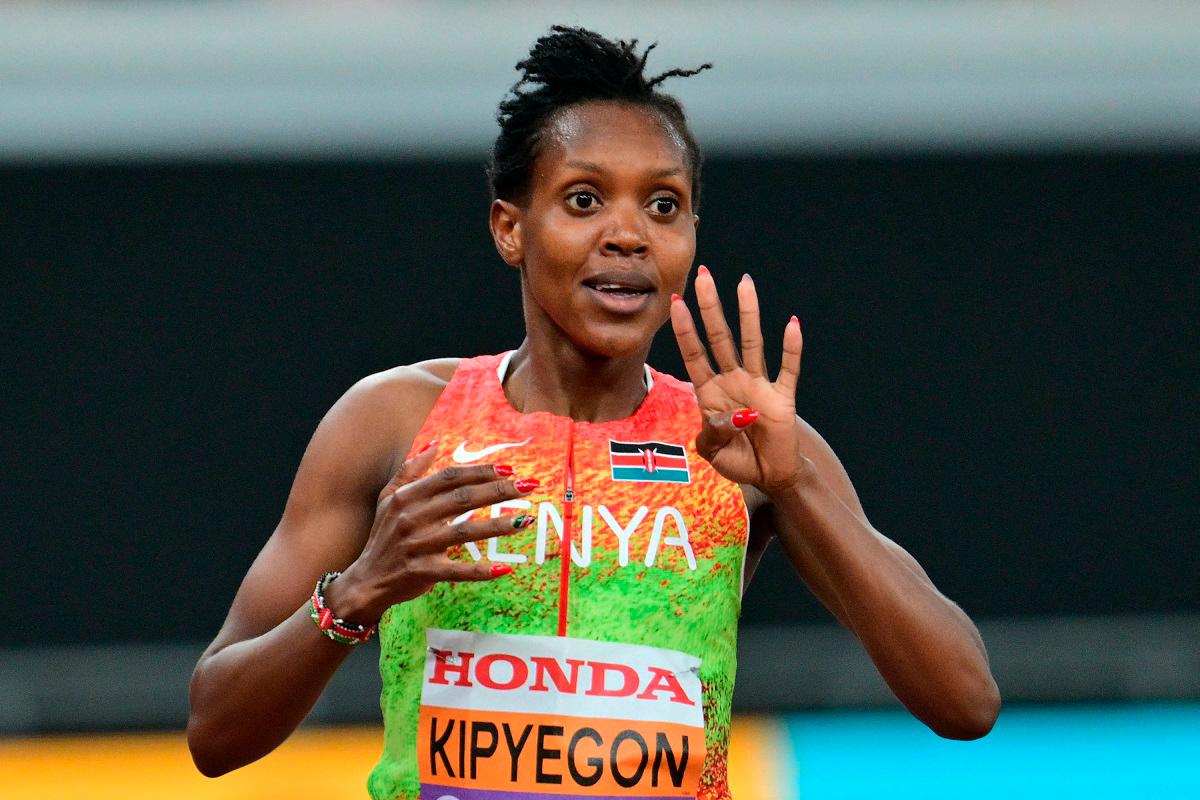 Kenya's Faith Kipyegon celebrates after winning the women's 1500m final during the World Athletics Championships in Tokyo on September 16, 2025. - Andrej ISAKOVIC / AFP