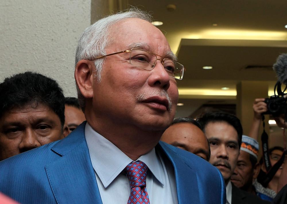 Former prime minister Datuk Seri Najib Abdul Razak arrives at the Kuala Lumpur Court Complex today. - Bernama