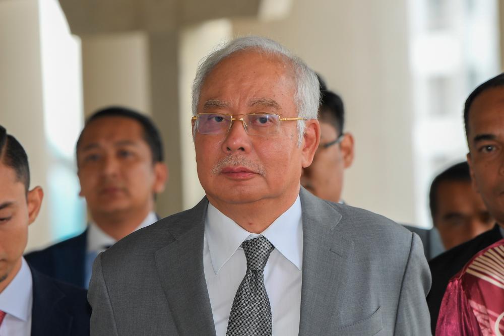 Former prime minister Datuk Seri Najib Abdul Razak appears to have come out of the Kuala Lumpur High Court chambers after giving evidence today. - Bernama