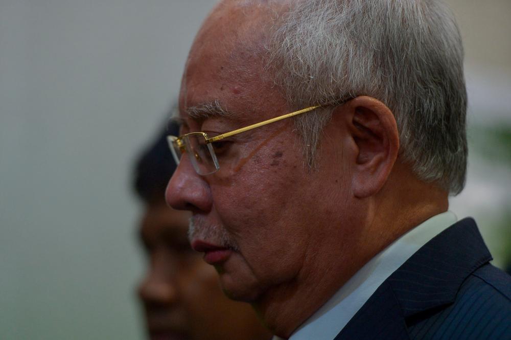 Former prime minister Datuk Seri Najib Abdul Razak appears at the Kuala Lumpur Court Complex today. - Bernama