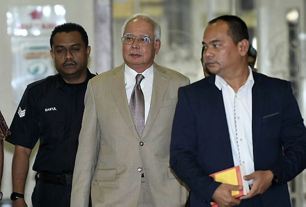Former prime minister Datuk Seri Najib Abdul Razak arrived to attend a trial involving SRC International Sdn Bhd’s fund, totalling RM42 million at the Kuala Lumpur High Court on April 17, 2019. — Bernama