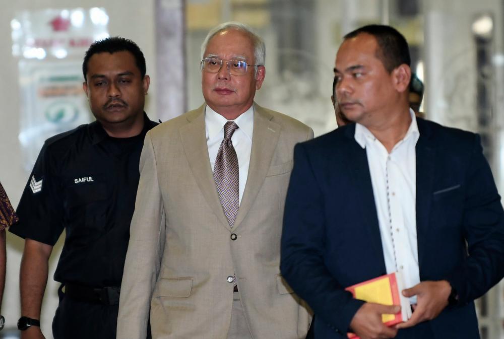Former prime minister Datuk Seri Najib Abdul Razak arrives for his trial case involving RM42 million in misappropriated funds from SRC International Sdn Bhd, at the Kuala Lumpur High Court on April 17, 2019. — Bernama