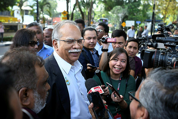 Filepix shows Penang Deputy Chief Minister II Dr P. Ramasamy arriving at the Bukit Aman Police Headquarters yesterday. — Bernama
