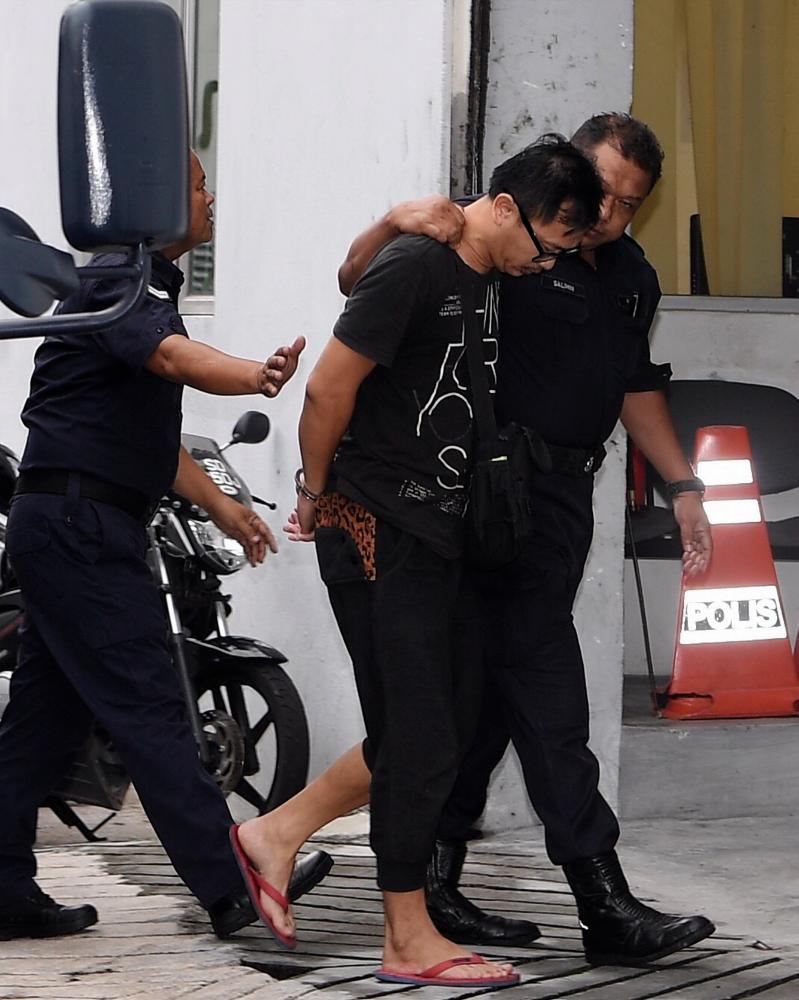 Yew Wei Liang, 41, is brought to the Kajang magistrates’ court today on the charge of killing Syed Muhammad Danial Syed Shakir during a recent alleged road rage incident. - Bernama