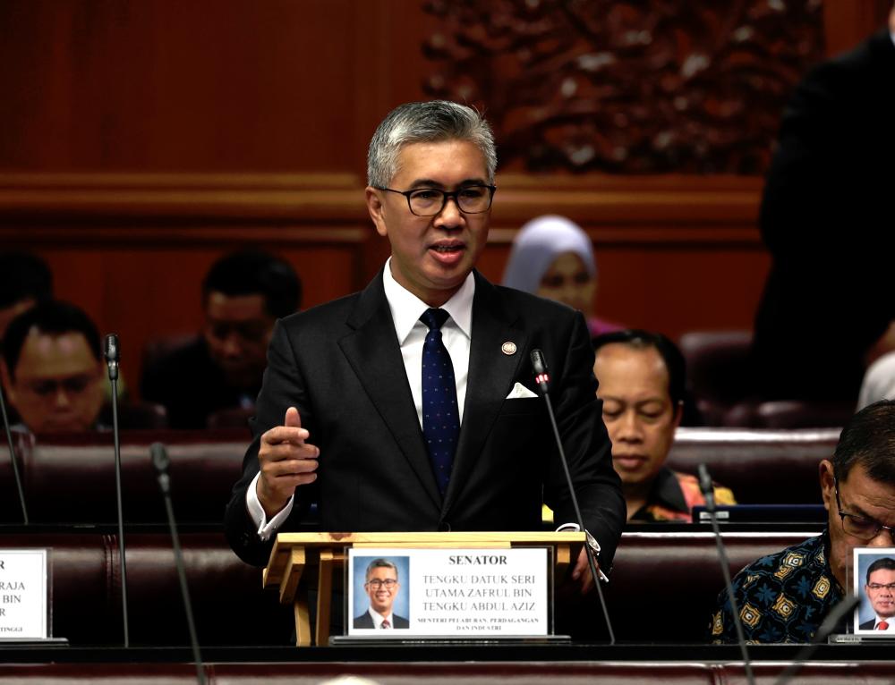 Tengku Zafrul speaking during the question-and-answer session in the Dewan Negara today. – Bernamapic