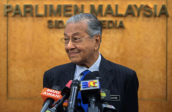 Filepix taken on July 11 shows Prime Minister Tun Dr Mahathir Mohamad speaking to the press in the parliament building. — Bernama