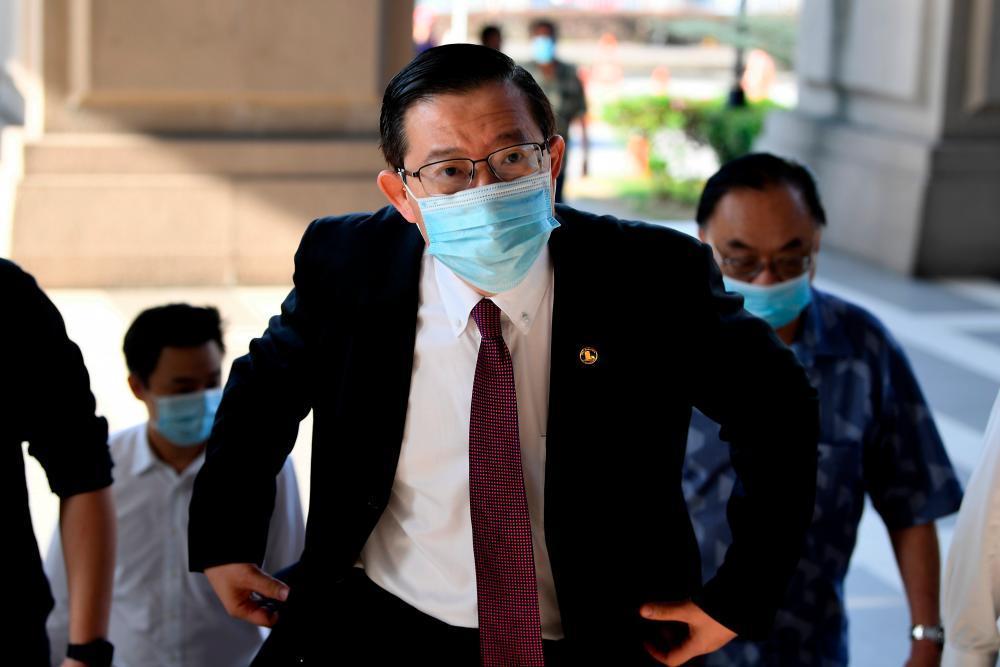 Former Finance Minister Lim Guan Eng, who was charged with soliciting gratification to help a company to secure the Penang undersea tunnel project, present to the Session Court today for the mention case. — Bernama