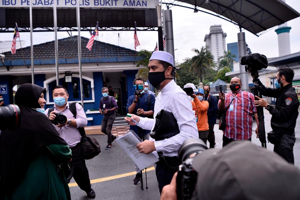 Hot Burger Malaysia founder Mohd Asri Hamid, or Asri Janggut, arrived at Bukit Aman today for questioning for allegedly making statements that insulted the police force. - Bernama