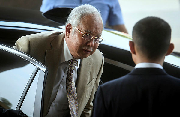1MDB trial postponed again due to Najib’s eye problem