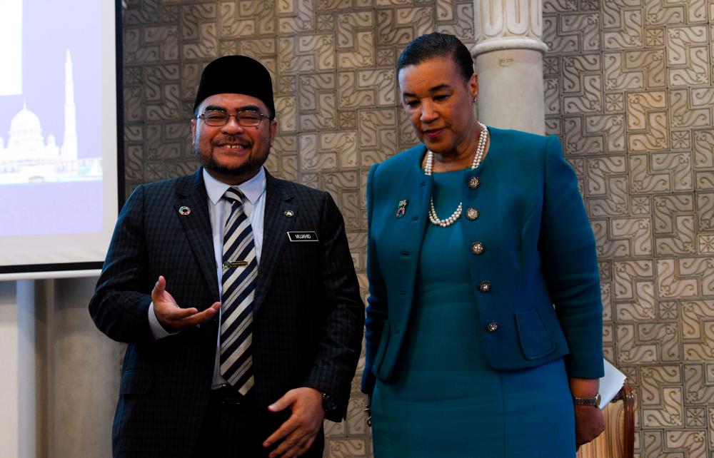 Minister in the Prime Minister’s Department Datuk Seri Dr Mujahid Yusof Rawa with Commonwealth secretary-general Patricia Scotland during a seminar on ‘Faith in the Commonwealth’ at the International Institute of Islamic Civilisation and the Malay World in Kuala Lumpur today. - Bernama