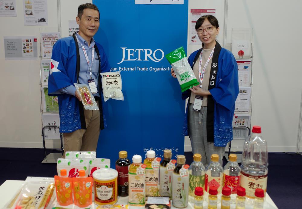 Jetro KL deputy managing director Manabu Saito (left) and Jetro KL project coordinator Lim Yen Yi at the Jetro booth to promote Japanese Halal-certified food products and ingredients at MIHAS 2022 recently.