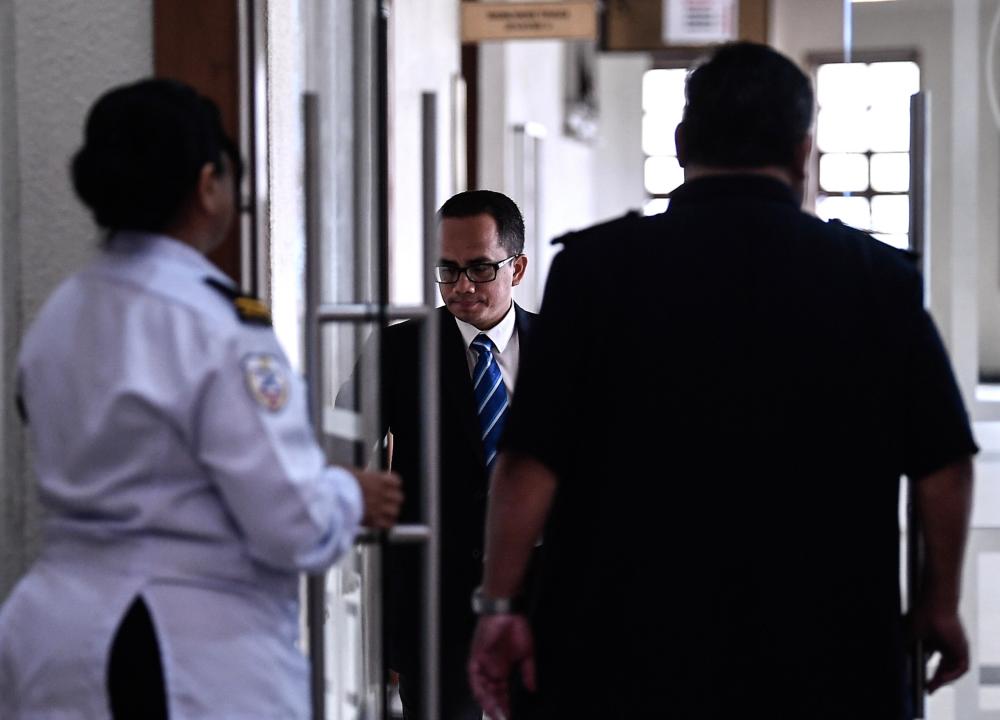 Bank Negara Malaysia’s managing director Azizul Adzani Abdul Ghafar present at the Criminal High Court 3 for the trial of former Prime Minister Datuk Seri Najib Abdul Razak on three counts of criminal breach of trust and a charge of abuse of power involving SRC International funds amounting to RM42 million, on April 16, 2019. — Bernama