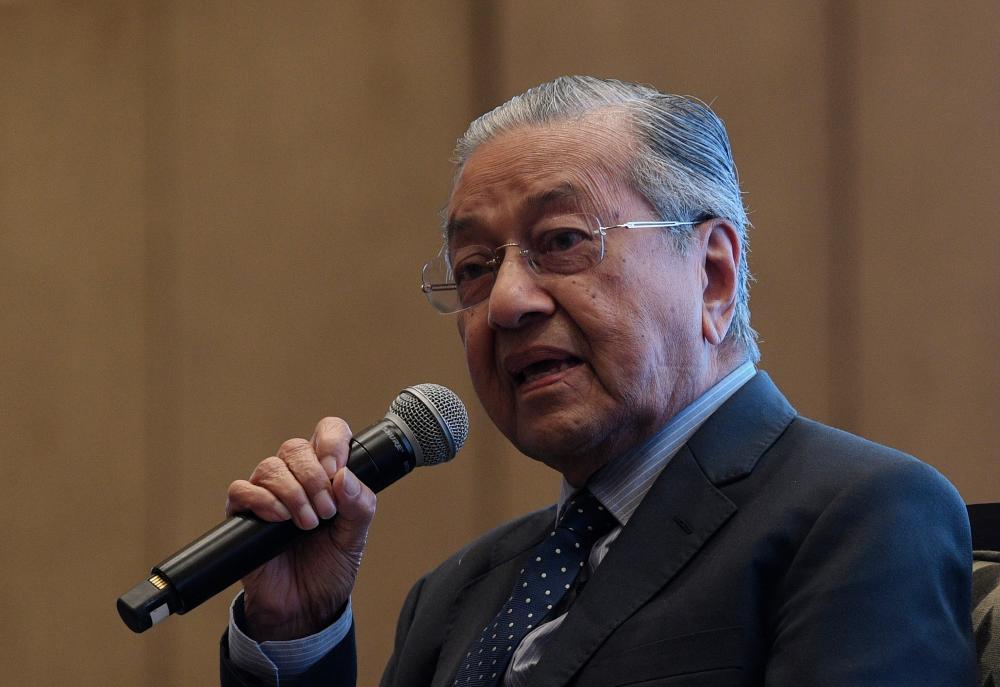 Prime Minister Tun Dr Mahathir Mohamad during a question-and-answer session at the Isis Malaysia Praxis Conference “Malaysia Beyond 2020” on Oct 21, 2019. — Bernama