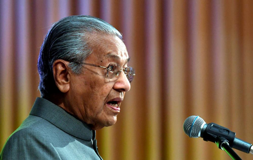 Prime Minister Tun Dr Mahathir Mohamad delivers his Thematic Address on Demystifying Islamophobia: Towards A Deeper Understanding of Islam at the Institut Kefahaman Islam Malaysia (IKIM) International Colloquium Series on Islamic Understanding on Nov 11, 2019. — Bernama