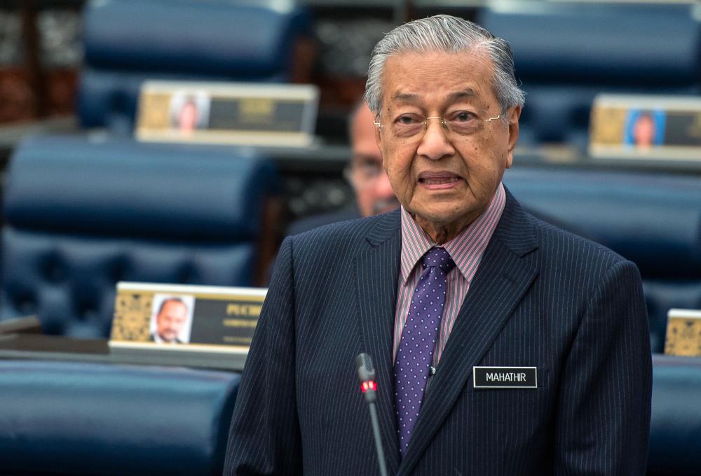 Prime Minister Tun Dr Mahathir Mohamad answers questions during today’s parliamentary session. - Bernama