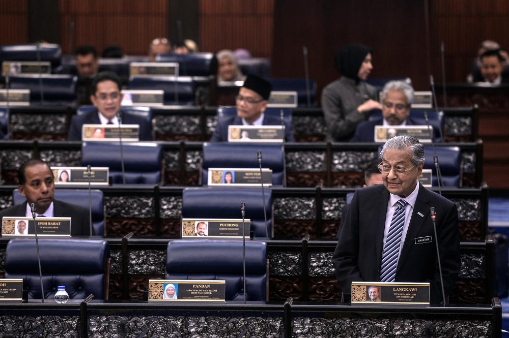 Prime Minister Tun Dr Mahathir Mohamad speaks during the Dewan Rakyat sitting in Parliament on July 10, 2019. - Bernama