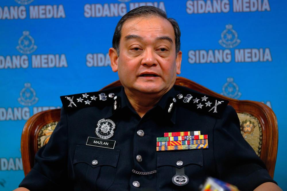 Deputy Inspector-General of Police Datuk Mazlan Mansor during a press conference at an event honouring the best district and state police contingents in the 15th Op Selamat in conjunction with Aidilfitri 2019 at Bukit Aman, today. - Bernama