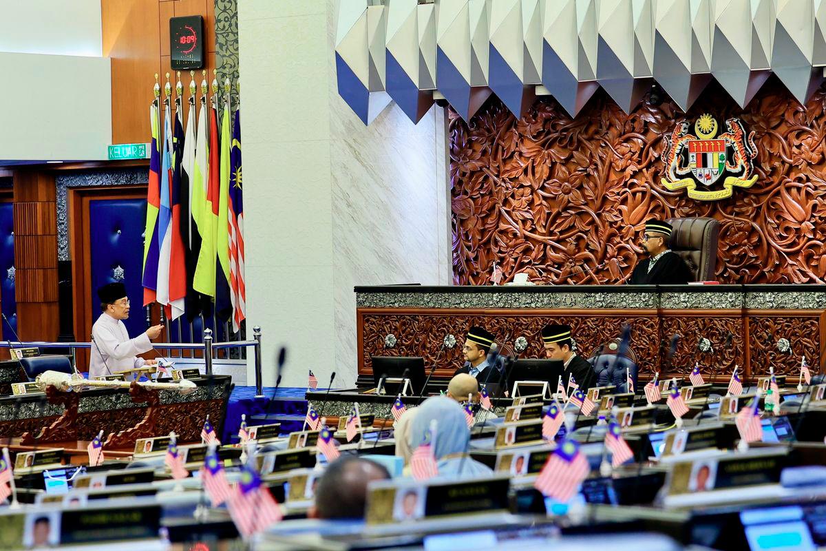 Prime Minister Datuk Seri Anwar Ibrahim answers questions during the Second Meeting of the Fourth Session of the 15th Parliament in the Dewan Rakyat, Parliament Building, today. - BERNAMA