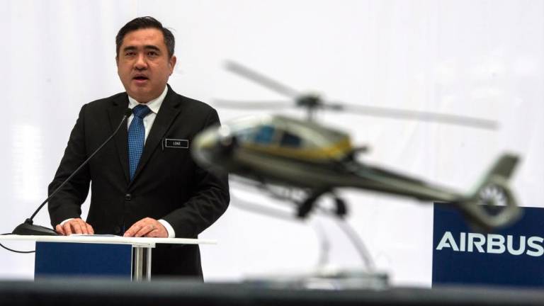 Transport Minister Anthony Loke Siew Fook delivers a speech during the opening ceremony of the Airbus Helicopter’s completion and delivery centre at Helicopter Centre Malaysia International Aerospace Centre, in Subang today. — Bernama