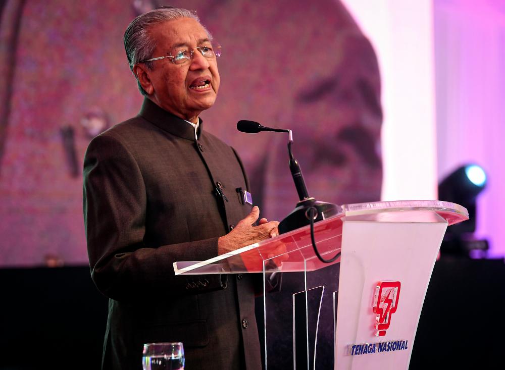Prime Minister Tun Dr Mahathir Mohamad speaks during the opening the An-Nur Balai Islam Complex at the TNB headquarters. — Bernama