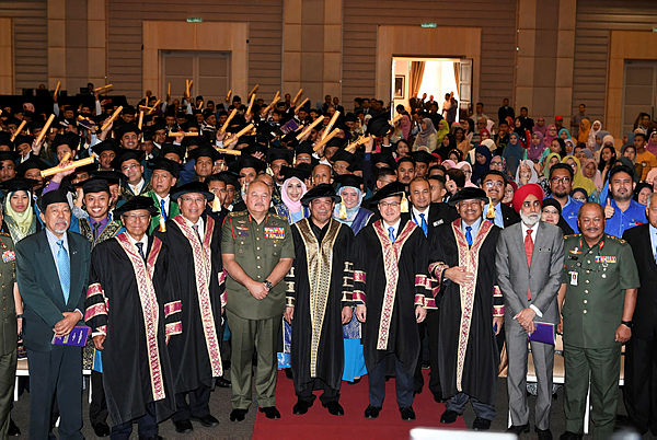 Defense Minister Mohamad Sabu is pictured with graduates at the 52nd Armed Forces Ex-Servicemen Affairs Corporation (Perhebat) convocation ceremony at Wisma Perwira ATM on Dec 23, 2018. — Bernama