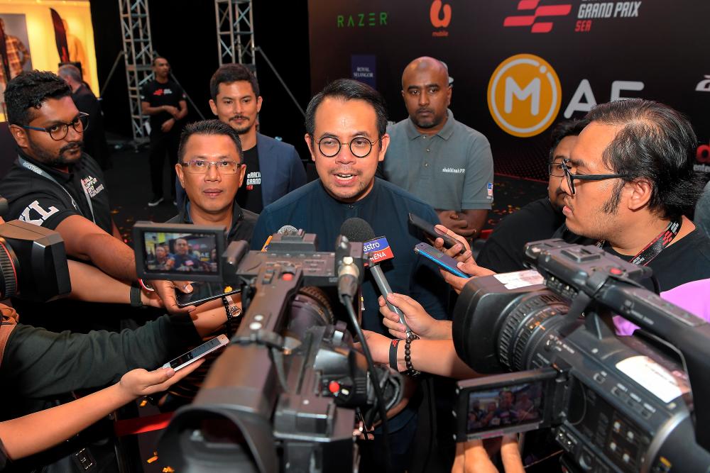 Deputy Youth and Sports Minister Steven Sim Chee Keong, speaks to the media during an eRacing event, on Sept 1, 2019. — Bernama