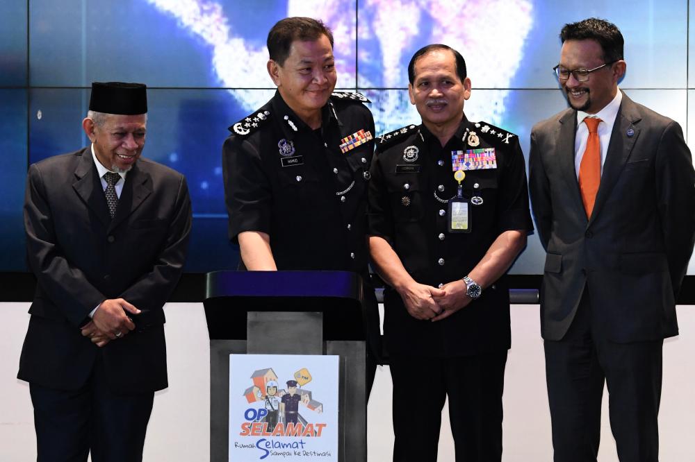 Inspector-General of Police Datuk Seri Abdul Hamid Bador (2nd from L) participates in the launch of Op Selamat 15/2019 in conjunction with the Aidilfitri celebration. - Bernama