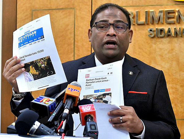 Baling MP, Datuk Seri Abdul Azeez Abdul Rahim speaks to reporters during a press conference at Parliament on Dec 3, 2018. — Bernama