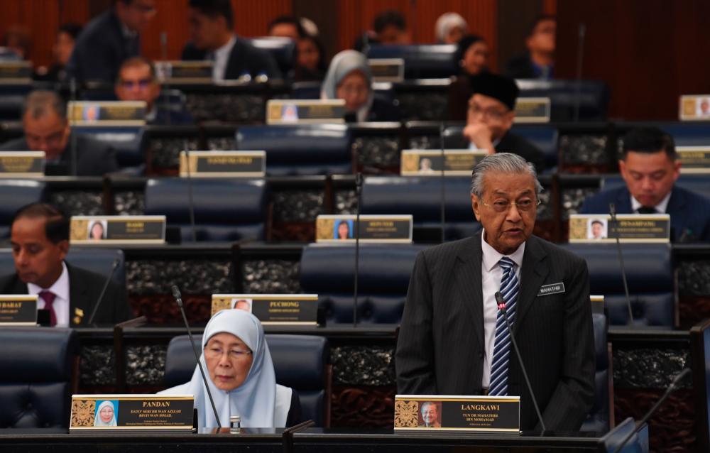 Prime Minister Tun Dr Mahathir Mohamad answers questions during the second term of the 14th Parliament. - Bernama