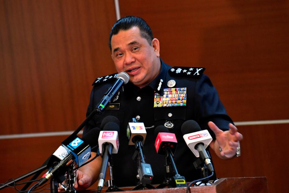 Federal police CID director Commissioner Datuk Huzir Mohamed at a press conference in Bukit Aman today. — Bernama