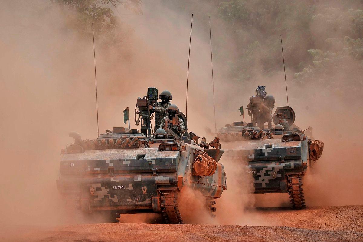 Gambar Hiasan Sahaja - Anggota Tentera Darat Malaysia menunjukkan kekuatan perisai jenis ACV 300 ADNAN- 81 mm Mortar ketika sesi Latihan Kuasa Tembakan 2021 yang dianjurkan Angkatan Tentera Malaysia (ATM) di Kem Syed Sirajuddin, Gemas pada Oct 2021 - BERNAMA