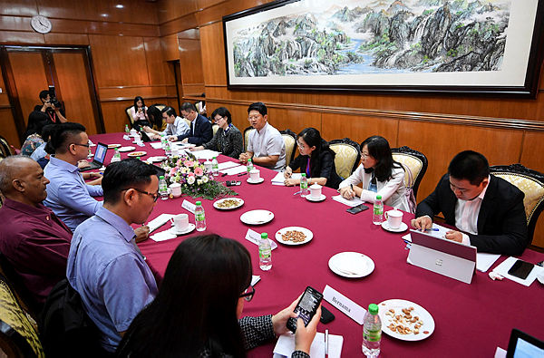 Chinese Ambassador to Malaysia Bai Tian (4th from R) attends a roundtable with the Malaysian media at the Chinese Embassy in Kuala Lumpur on April 18, 2019. — Bernama