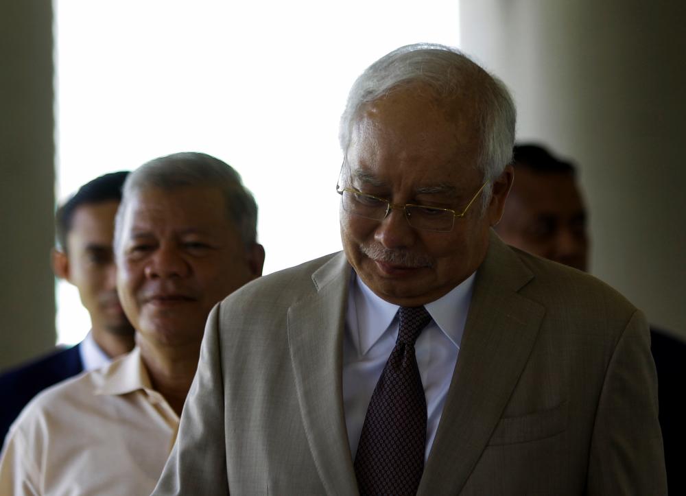 Former Prime Minister Datuk Seri Najib Abdul Razak arrives at the Kuala Lumpur Court Complex today. - Bernama