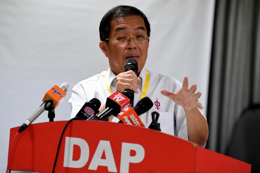 DAP chairman Tan Kok Wai, who is also Kuala Lumpur DAP chairman, gives his welcoming speech at the Kuala Lumpur DAP Annual Convention today. - Bernama